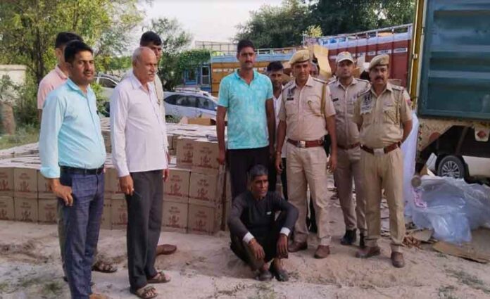 Police caught a smuggler with a container filled with liquor worth Rs 45 lakh