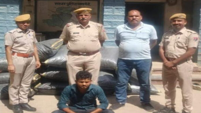 A smuggler arrested with drugs worth Rs 38.50 lakh