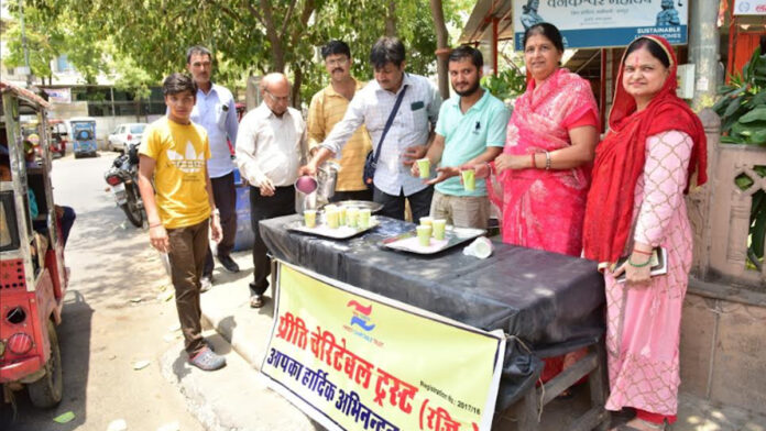 Distribution of milk roses and sherbet by Preeti Charitable Trust